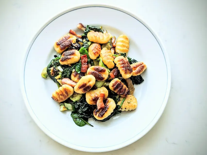 Gnocchi with Bacon and Sautéed Greens image